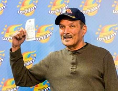 Naperville man wins $265 million lottery prize .
